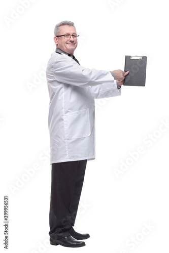 Doctor is wearing white uniform and a tie withe clipboard, stands on a light white background