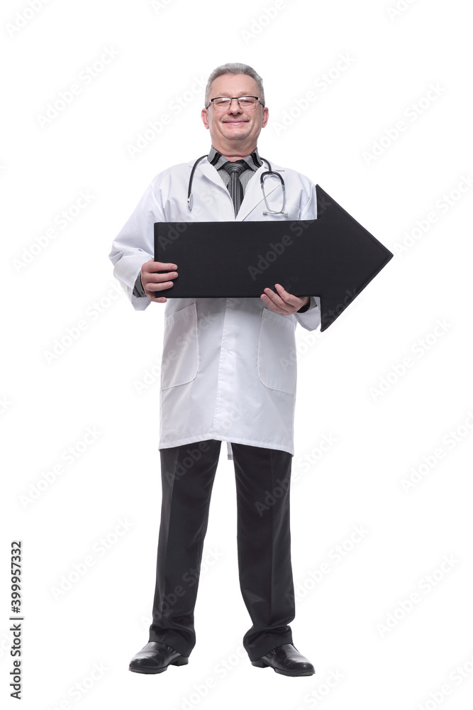 Mature doctor holding a black arrow pointing right Mature doctor holding a black arrow pointing right