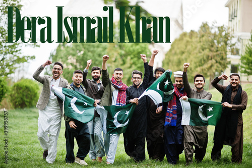 Dera Ismail Khan city. Group of pakistani man wearing traditional clothes with national flags. Biggest cities of Pakistan concept.