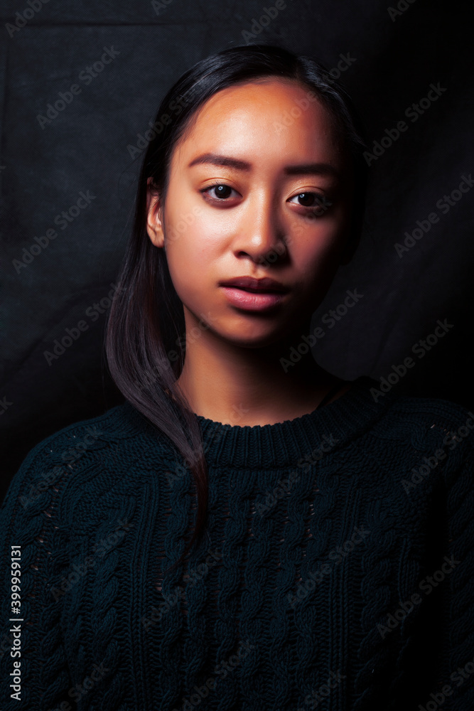 pretty young asian girl posing sensitive on black background, lifestyle people concept pretty young asian girl posing sensitive on black background, lifestyle people concept