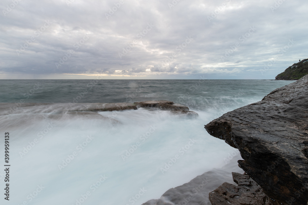 High tide water flowing into the coastline. High tide water flowing into the coastline.