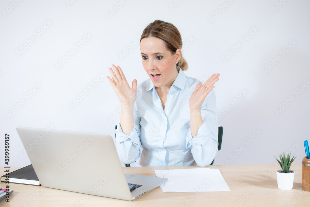 A excited young business woman yelling isolated on white background A excited young business woman yelling isolated on white background