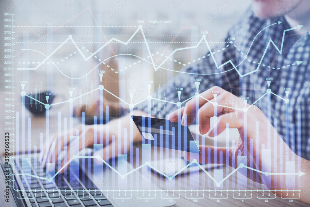Double exposure of man hands holding a credit card and Forex graph drawing. Stock trading and digital fintech in Internet E-commerce concept. Double exposure of man hands holding a credit card and Forex graph drawing. Stock trading and digital fintech in Internet E-commerce concept.