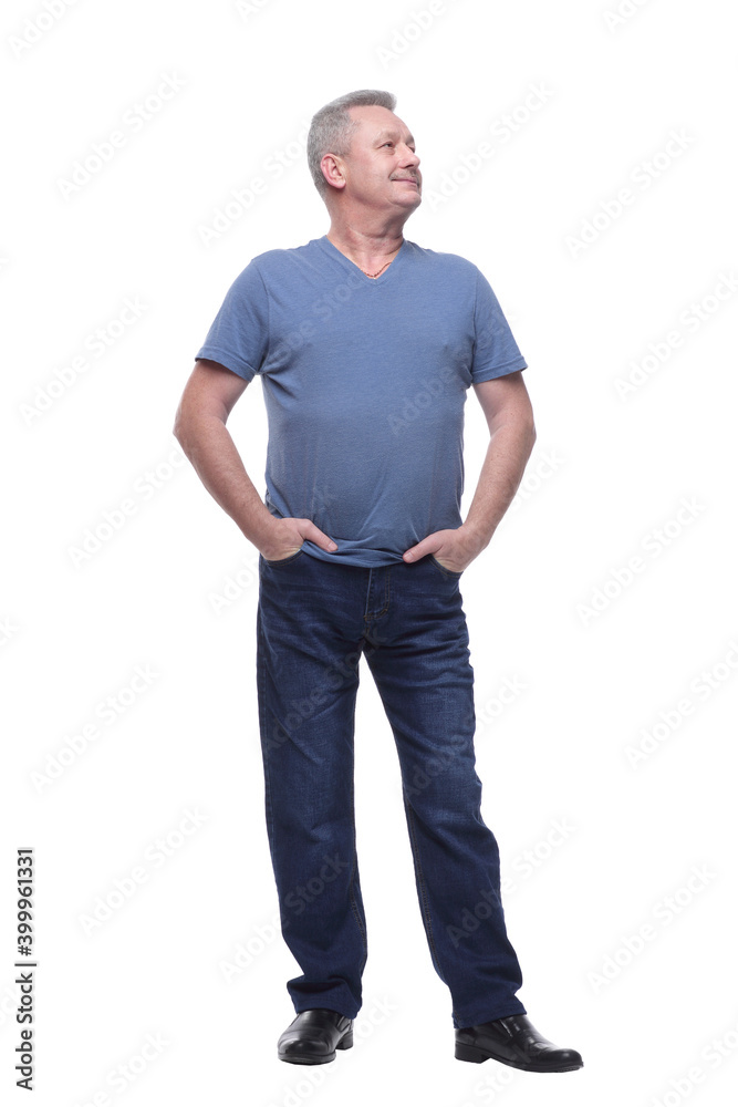 Smiling middle aged man standing with his hands in pockets Smiling middle aged man standing with his hands in pockets