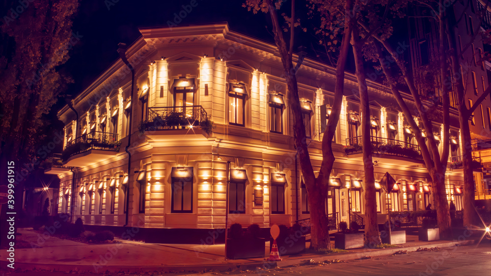 A lighted building at night in Chisinau