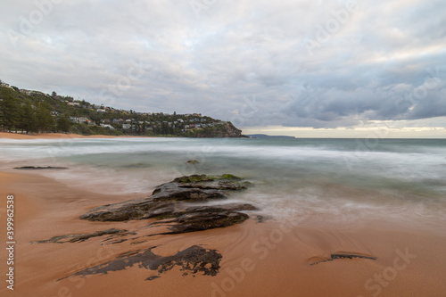 Cloudy view of the coast of Whale Beach in the morning  Sydney  Australia.