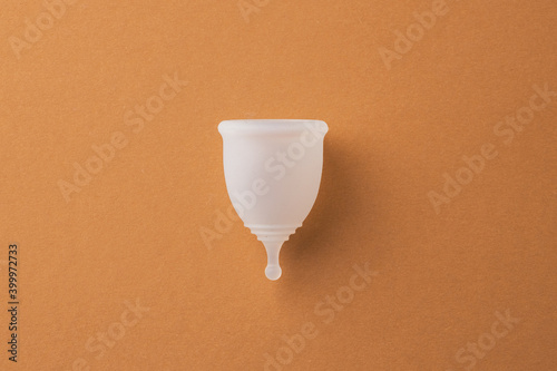 Top view of menstrual cup on paper photo