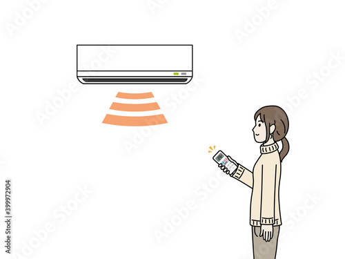暖房をつける女性のイラスト