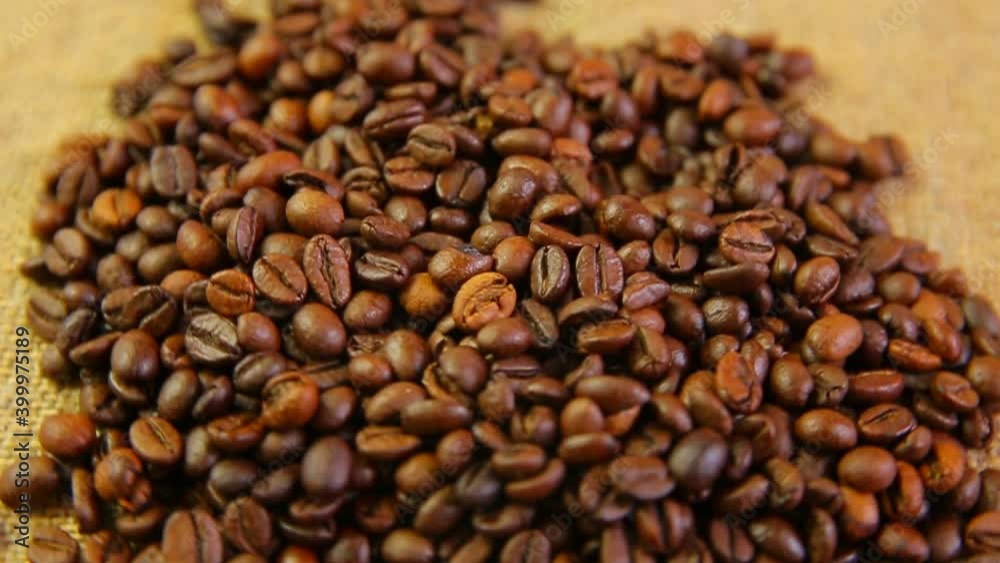 coffee beans spinning on a white background coffee beans spinning on a white background