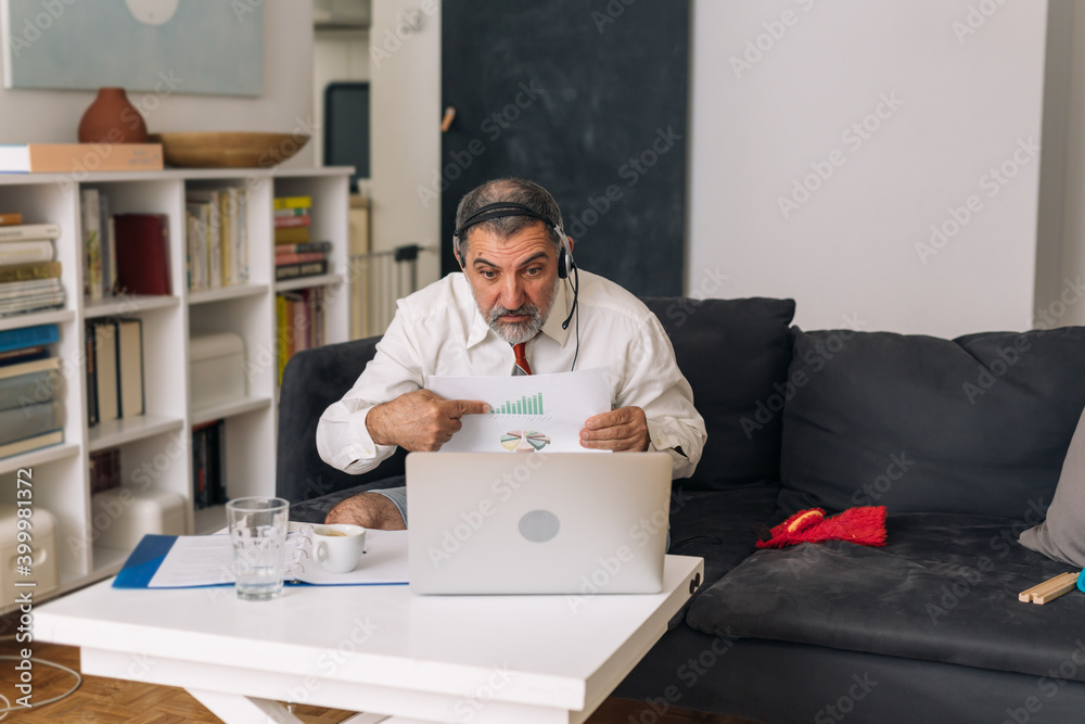 businessman have zoom meeting from home. coronavirus isolation concept