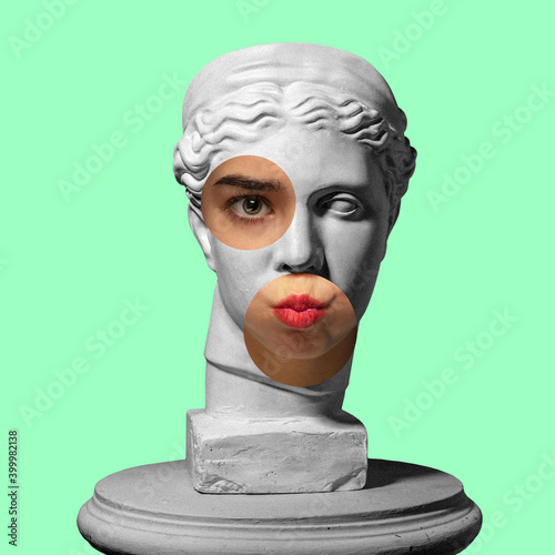 Collage with plaster head model, statue and female portrait isolated on green background. Negative space to insert your text. Modern design. Contemporary colorful and conceptual bright art collage.