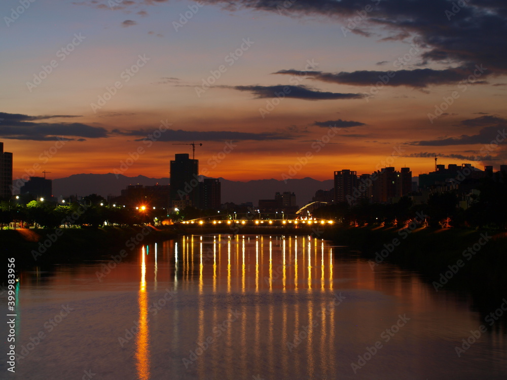 Bridge with lights at dawn