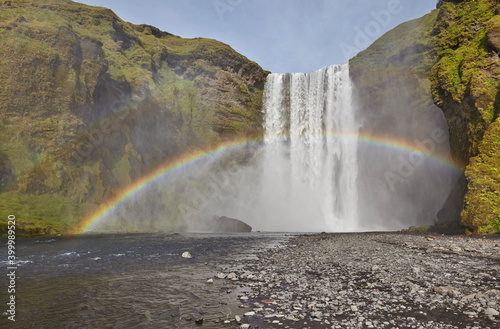 A permanent rainbow in waterfall spray, Skogafoss Falls, near Vik, southern Iceland photo