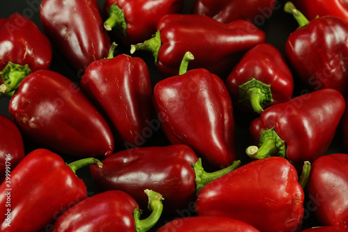 Fototapeta Naklejka Na Ścianę i Meble -  Red peppers on black background