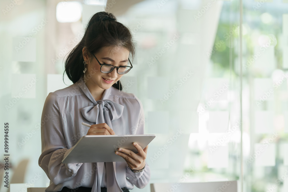 Portrait of businesswoman working with digital tablet. Portrait of businesswoman working with digital tablet.
