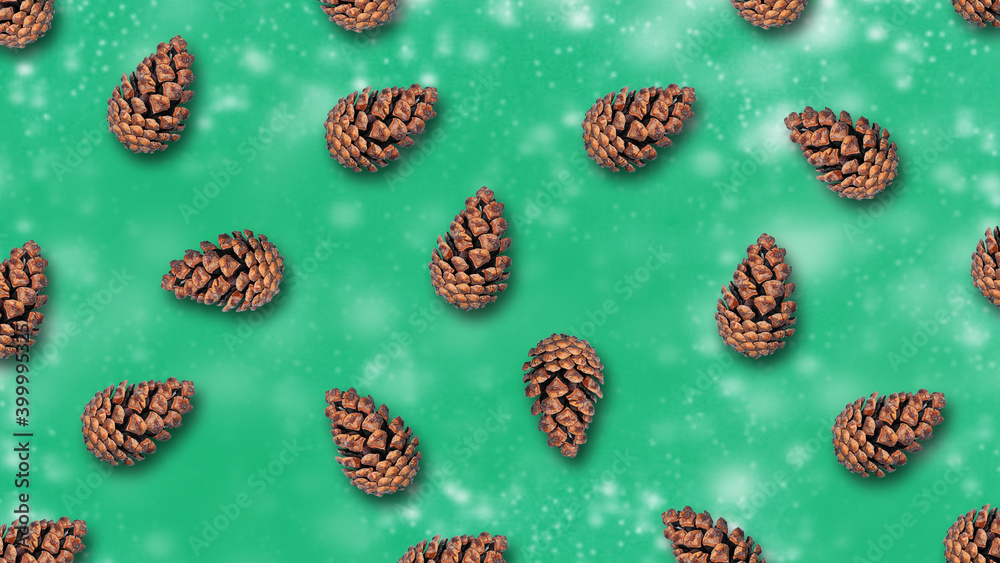Christmas cones on a green background. Snow effect. Ornament. Christmas, New Year background. Christmas cones on a green background. Snow effect. Ornament. Christmas, New Year background.