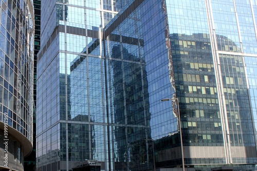 Reflection in the mirrored glasses of skyscrapers in Moscow