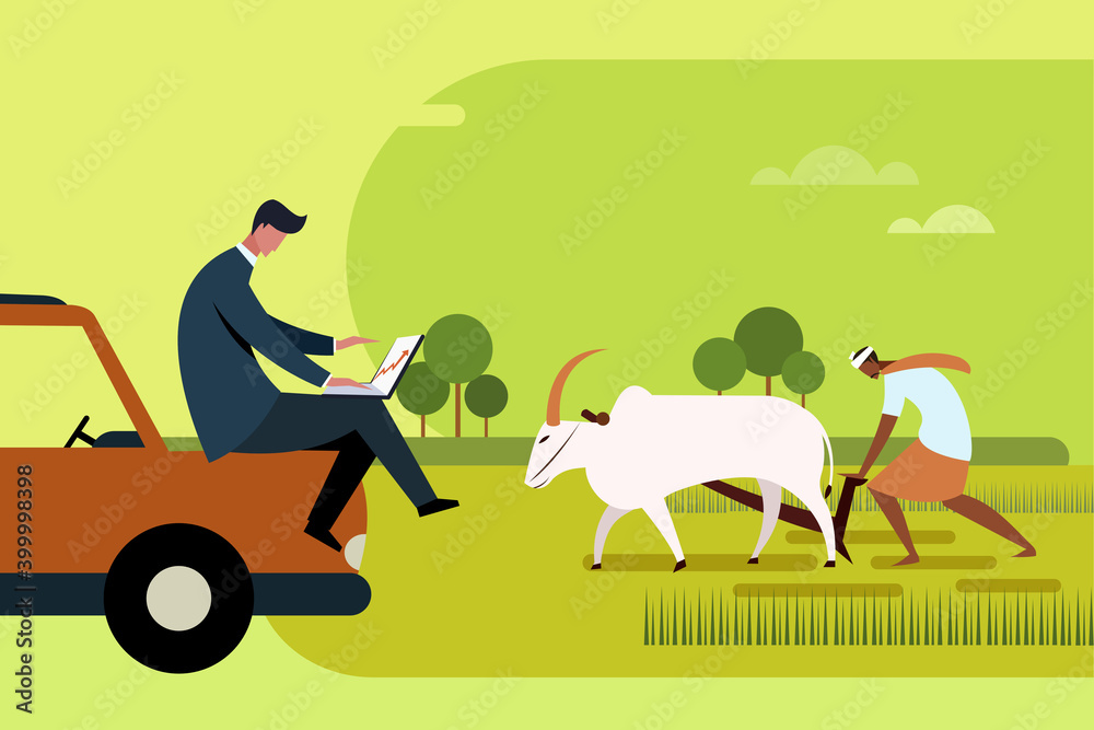 Φωτογραφία An agri business executive looks at his laptop when a farmer ploughs the farm wi