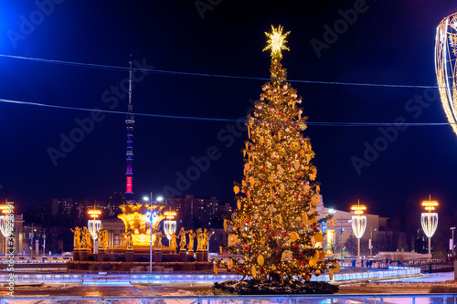Ostankino TV tower, Peoples' Friendship Fountain and New Year's and Christmas decorations at the Peoples' Friendship Square of VDNKh, Moscow, Russian Federation, December 05, 2020