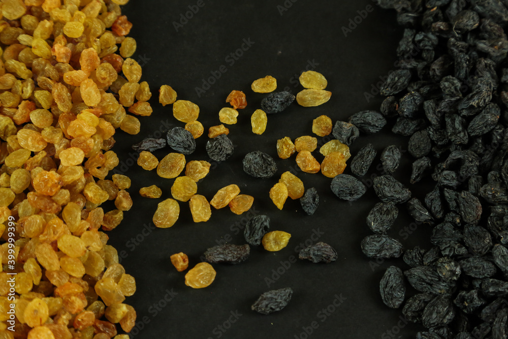 Dried raisins on white background Dried raisins on white background