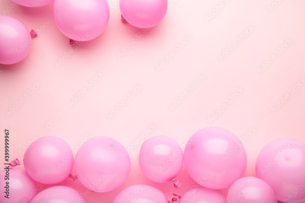 Pink balloons on pastel pink background. Birthday, holiday concept.