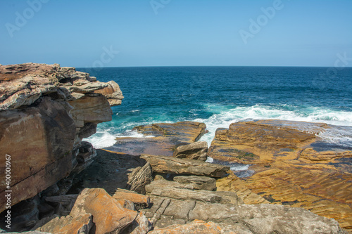 Dramatic rocky coastline of the Shark Point on the Coogee - Bondi Coastal Walk near Sydney, New South Wales, Australia