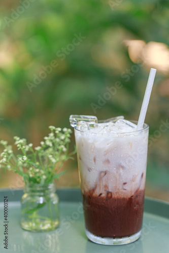 Iced cocoa in a glass in the garden