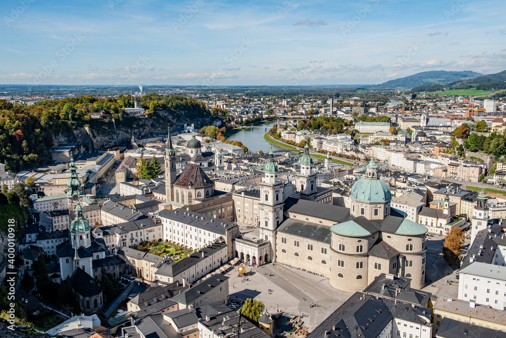 An aerial view of historical part of the city of Salzburg and Salzach river