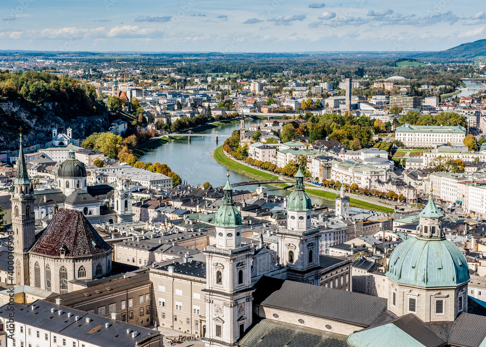 An aerial view of historical part of the city of Salzburg and Salzach river