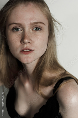 Model test with young beautiful female model with blonde hair