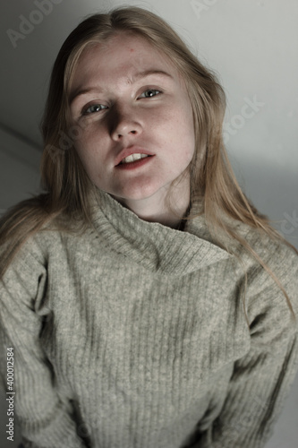 Model test with young beautiful female model with blonde hair