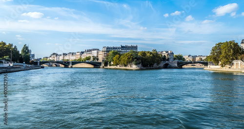 beautiful buildings along the banks of the seine seen from the boat