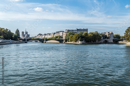 beautiful buildings along the banks of the seine seen from the boat © Alessio