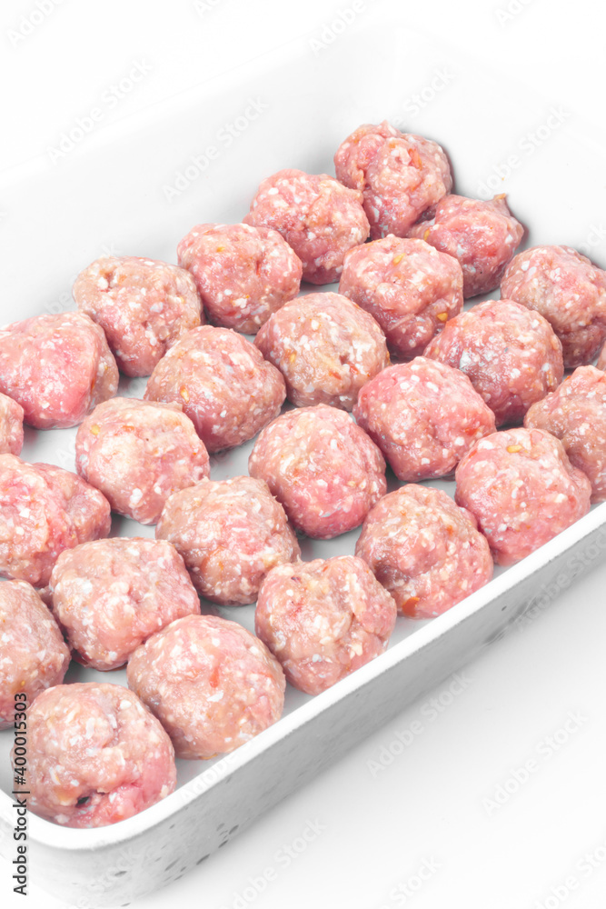 raw meat balls isolated on white raw meat balls isolated on white