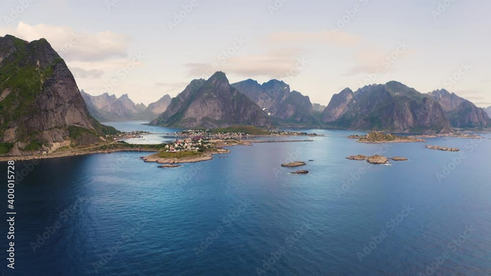Aerial view of Reine village with mountains and fjords on Lofoten islands Aerial view of Reine village with mountains and fjords on Lofoten islands