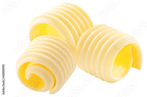 Butter curls rolled up, a group of three,  isolated