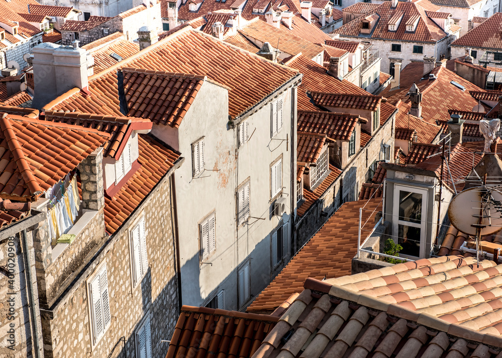View of sandstone walls and red tiled roofs in the city of Dubrovnik, Croatia