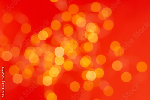Christmas holiday background with festive bokeh on red background. Ready-to-install products. blur and bokeh. holiday blur lights. copy space. space for text
