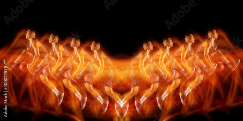 Εκτύπωση καμβά Young purposeful basketball player training in action on black background with fire flames