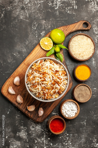 top view cooked rice with seasonings on dark desk meal dark dish east food