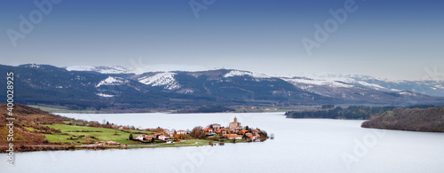 Ullibarri Gamboa lake and village in winter in Basque Country photo
