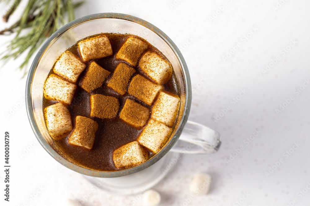 Hot coffe with marshmallows in transparent tall glass, isolated on white background. Hot coffe with marshmallows in transparent tall glass, isolated on white background.
