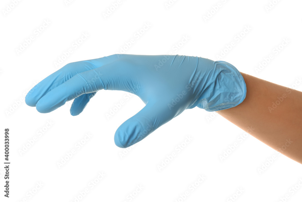 Person in blue latex gloves holding something against white background, closeup on hand Person in blue latex gloves holding something against white background, closeup on hand