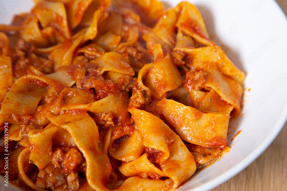 Close up of the plate of Bolognese noodles. Mediterranean food Close up of the plate of Bolognese noodles. Mediterranean food