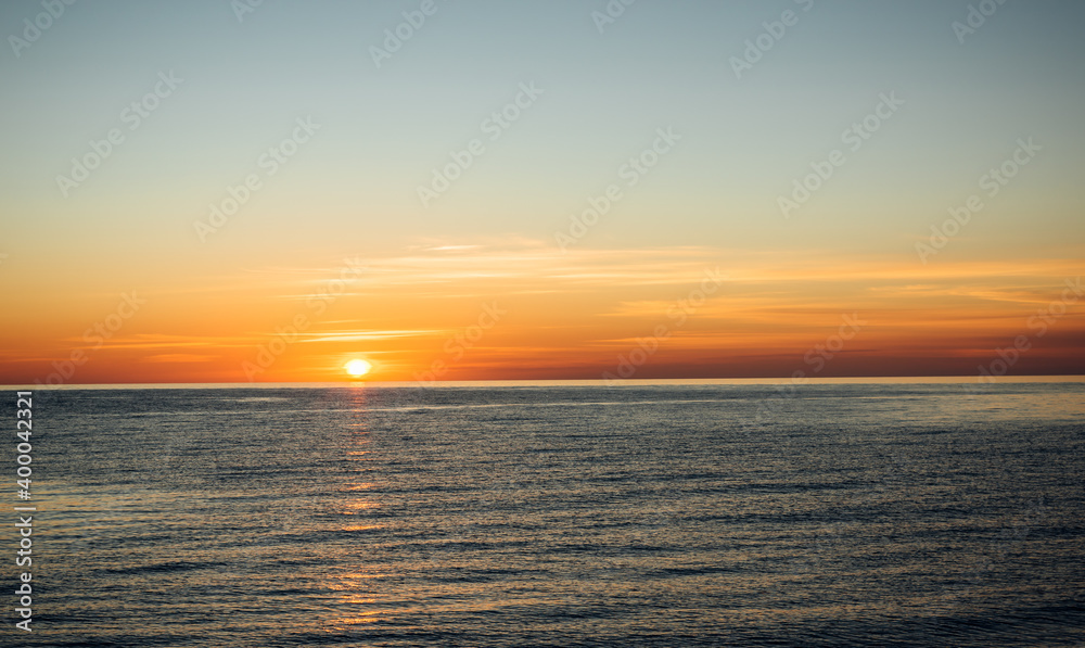 Sunset at sea. Sun over the sea. Sea landscape.