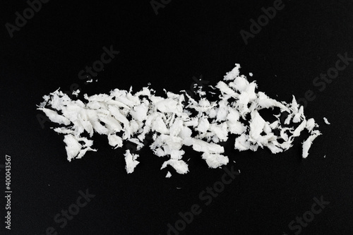 Fototapeta Naklejka Na Ścianę i Meble -  white artificial synthetic snow on black background