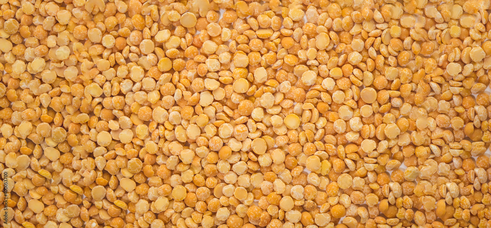 yellow dry peas background texture. banner