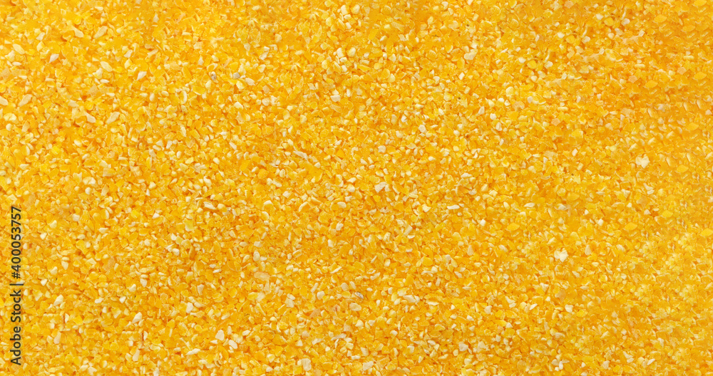 Corn grits groat background. Top view, close up. Macro texture. banner Corn grits groat background. Top view, close up. Macro texture. banner