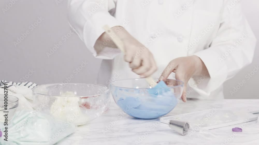 Step by step. Mixing food coloring with buttercream frosting. Step by step. Mixing food coloring with buttercream frosting.