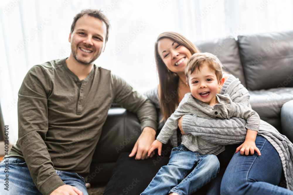 happy family mother and father having fun with child son at home happy family mother and father having fun with child son at home